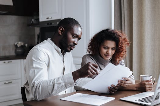 couple budgeting together